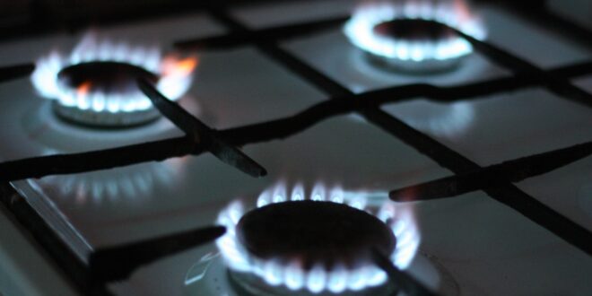 black gas stove with white and black gas stove